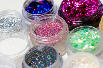 Obraz na płótnie Canvas Collection of nail glitters of different colors