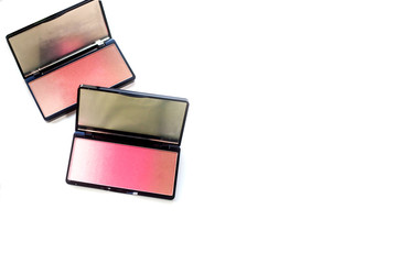 palettes of pink ombre blush Two compact open boxes with blush isolated on white background, top view. place for text. beauty and fashion concept