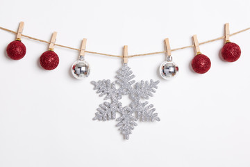 Christmas Decoration Hanging with Robe on White Background.Flat Lay,Top View