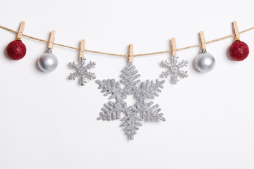 Christmas Decoration Hanging with Robe on White Background.Flat Lay,Top View