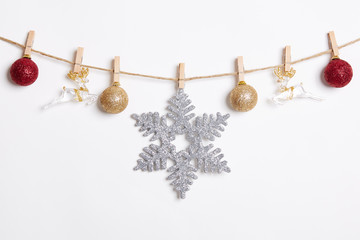 Christmas Decoration Hanging with Robe on White Background.Flat Lay,Top View