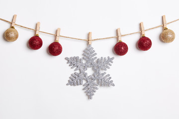 Christmas Decoration Hanging with Robe on White Background.Flat Lay,Top View