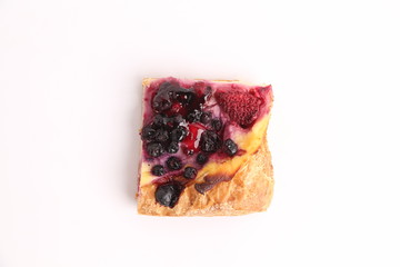 delicious piece of strawberry and blueberry pie