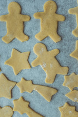 Baking cookies for Christmas. Cookies on baking sheet. Selective focus.