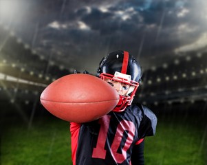 American football player against pitch background