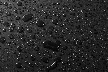 Water droplets on black background - Image texture