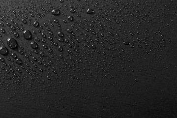 Water droplets on black background - Image texture