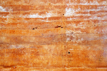 Clay walls pressed for the background.