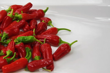 Red chili on paper white background