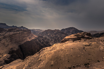 Obraz premium Petra - October 01, 2018: Landscape around the monastery of the ancient city of Petra, Wonder of the World, Jordan