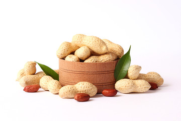  raw peanuts in shell on white background