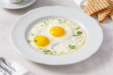 Omelette, fried eggs for breakfast