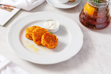 Potato patties in a plate on the table