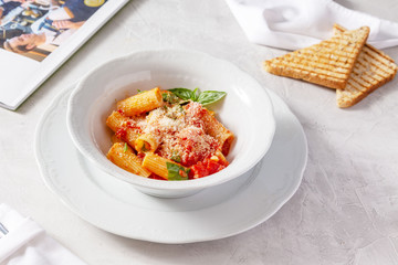 Pasta, Italian pasta with sauce in a plate on the table