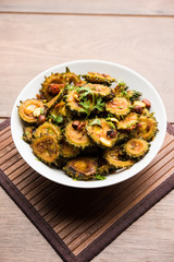 Cooked bitter Melon/gourd or Karela Sabzi served in a bowl. Scientific name of this healthy vegetable is Momordica charantia. selective focus