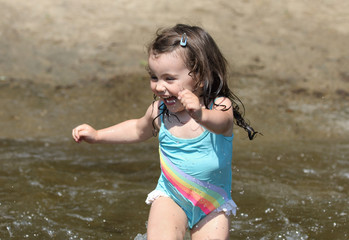 little girl in the water