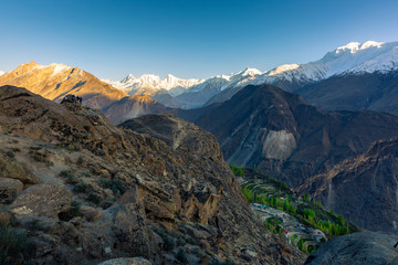 Scenic view of Hunza Valley in summer between the Karakoram Mountain range in Pakistan in the  morning.