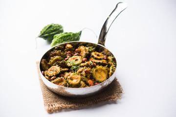 Delicious bitter melon curry, a healthy food from India. selective focus