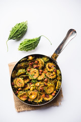 Delicious bitter melon curry, a healthy food from India. selective focus
