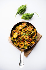 Delicious bitter melon curry, a healthy food from India. selective focus
