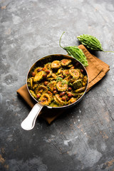 Delicious bitter melon curry, a healthy food from India. selective focus
