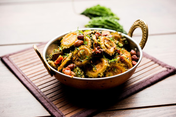 Cooked bitter Melon/gourd or Karela Sabzi served in a bowl. Scientific name of this healthy...