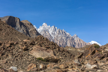 Fototapeta premium Landscape of snow capped mountain range. A view from the glacier, Babusar Pass, Khyber Pakhtunkhwa, Gilgit Baltistan, Northern Pakistan.