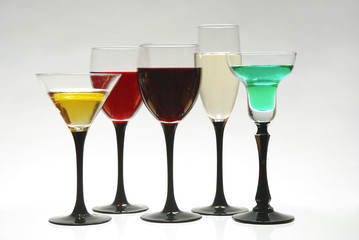 Glasses with cocktails and wine