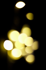 dark background with light in out of focus.