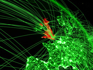 United Kingdom from space on model of green planet Earth with network. Concept of green technology, connectivity and travel.