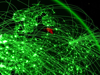 Estonia from space on model of green planet Earth with network. Concept of green technology, connectivity and travel.