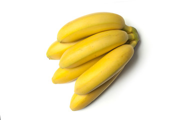 closeup of baby banana on white background