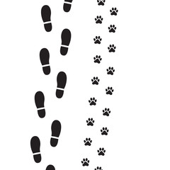 Human foot prints and dog paw prints.
