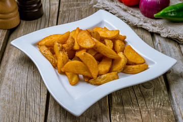 The potatoes wedges on the Board
