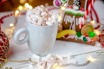 Fototapeta na wymiar cocoa with marshmallows on a white background, Christmas mood, Christmas toys, Christmas cookies