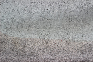 Facade wall grey gray pink surface texture close up