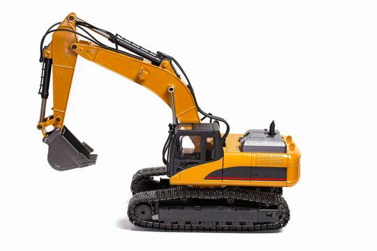 View of R/C model excavator racing cars on a white background. Free time Children and adults concept.