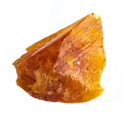 Natural rough piece of orange scheelite on a white background isolated