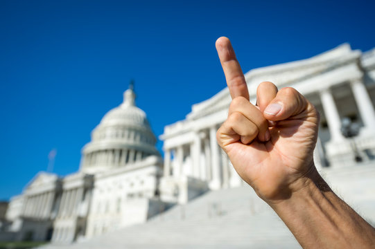 Hand of protestor making strong gesture at the Capitol Building in Washington DC, USA