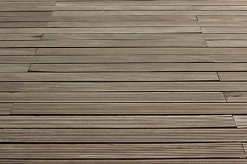 new cheap wooden deck floor background texture foreshortening with perspective lines surface wallpaper pattern concept with empty space for copy or your text