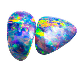 Polished natural colorful blue iridescent opal on white background isolated