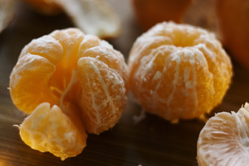 a few peeled ripe tangerines in the macro increase