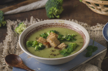 Homemade broccoli soup, fresh vegetable in and crispy croutons