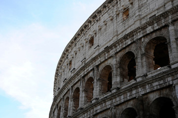 Fototapeta premium A section of the facade of the Colosseum (Flavian Amphitheatre) in Rome, Lazio, Italy