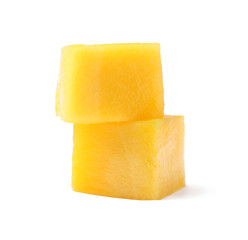 Fresh juicy mango cubes isolated on white