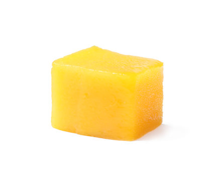 Fresh juicy mango cube isolated on white