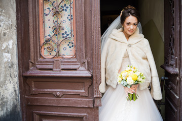 Naklejka premium Portrait of beautiful european bride in autumn