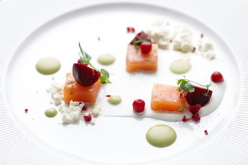 Salmon served in a restaurant specializing in molecular cuisine