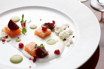 Salmon served in a restaurant specializing in molecular cuisine