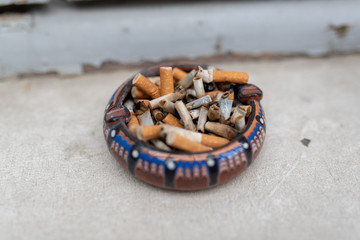 Fototapeta na wymiar old dirty ashtray